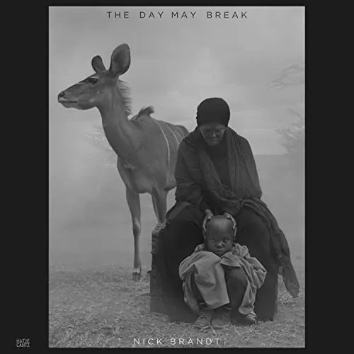 Couverture de The Day May Break